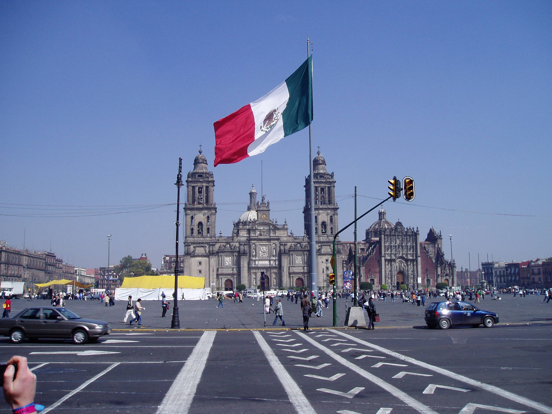 Mexico Flag On City Streets Background