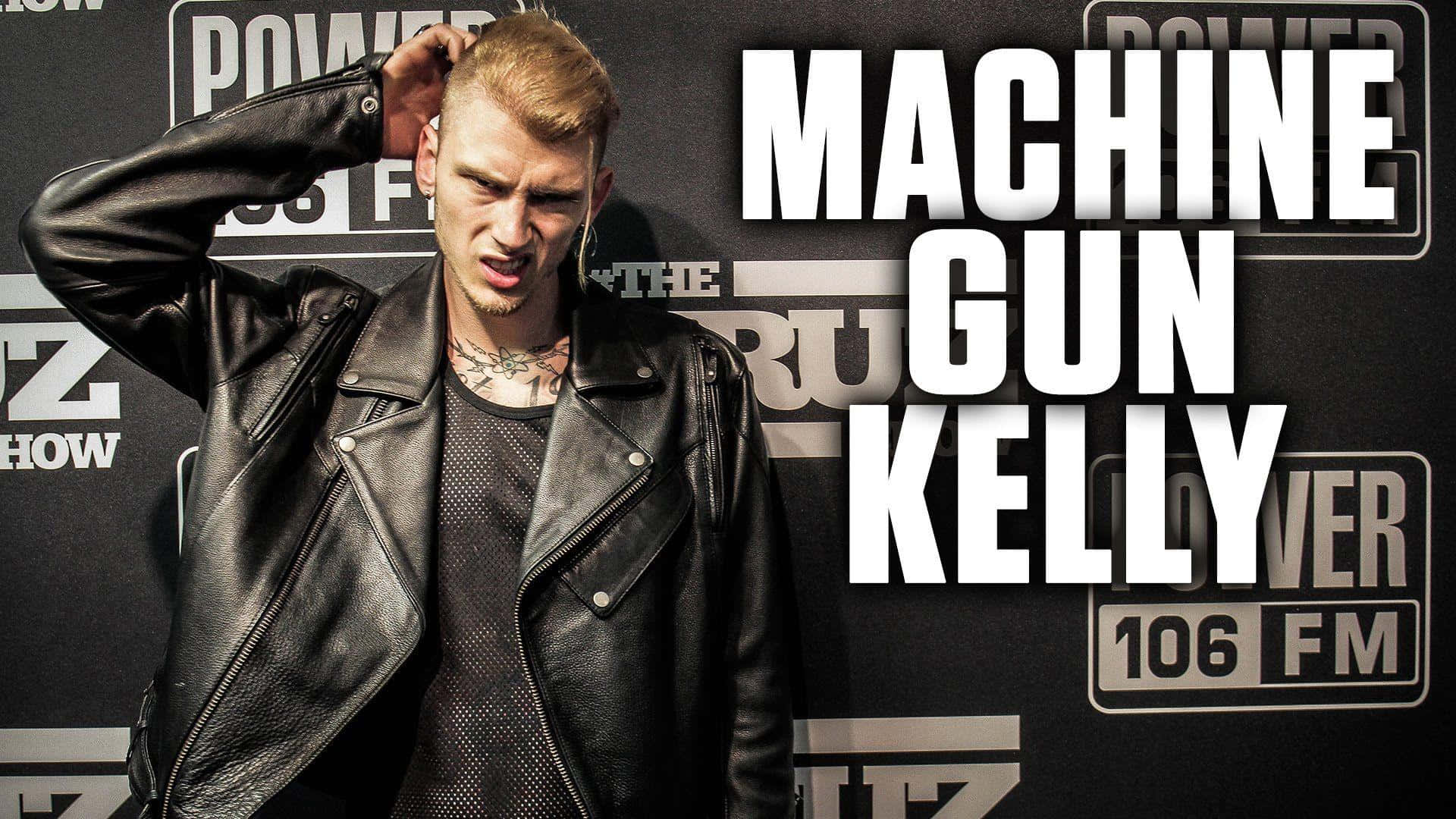 Mgk Wearing A Leather Jacket Background
