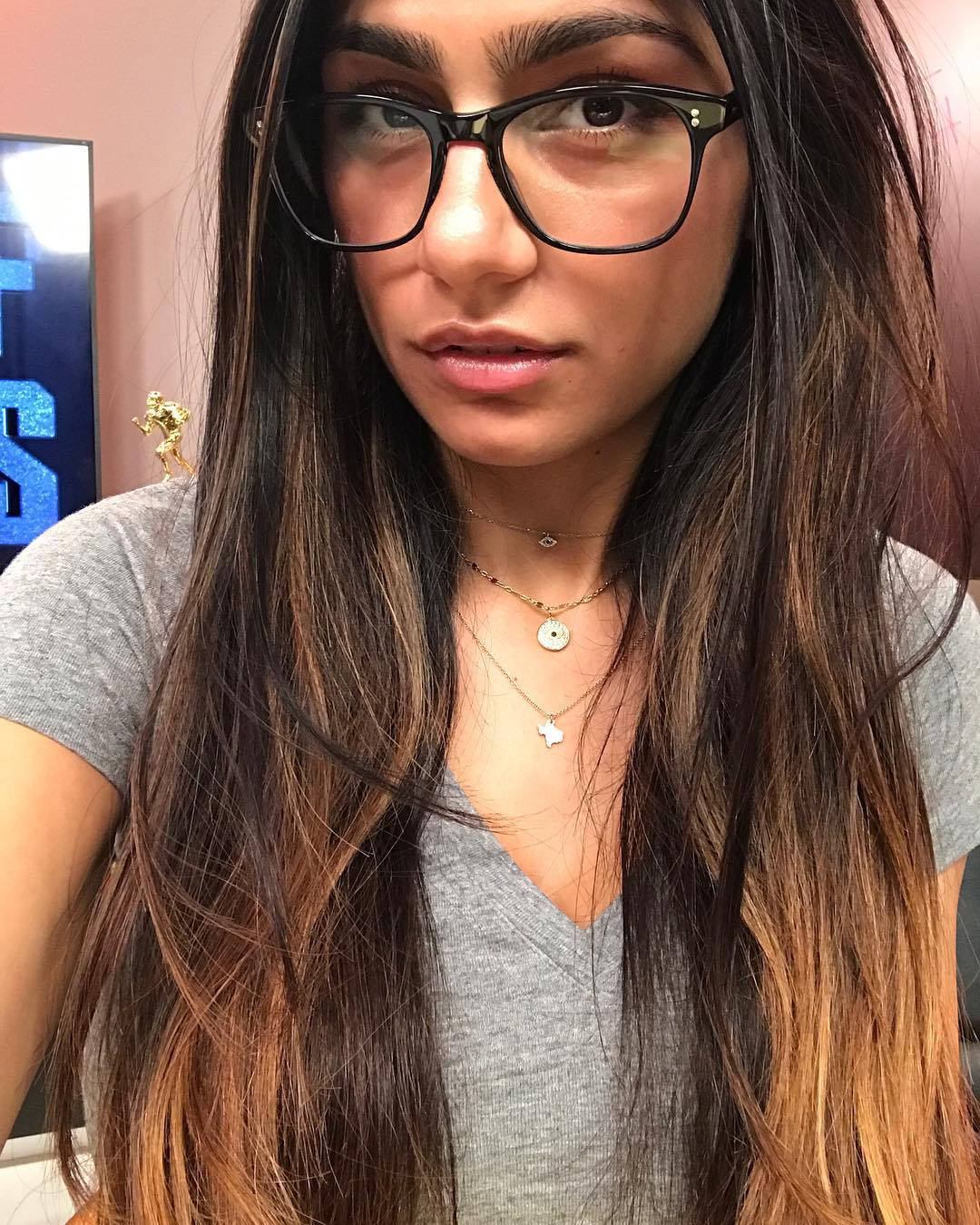 Mia Khalifa Glowing In Reflection: Eyeglass Selfie Background