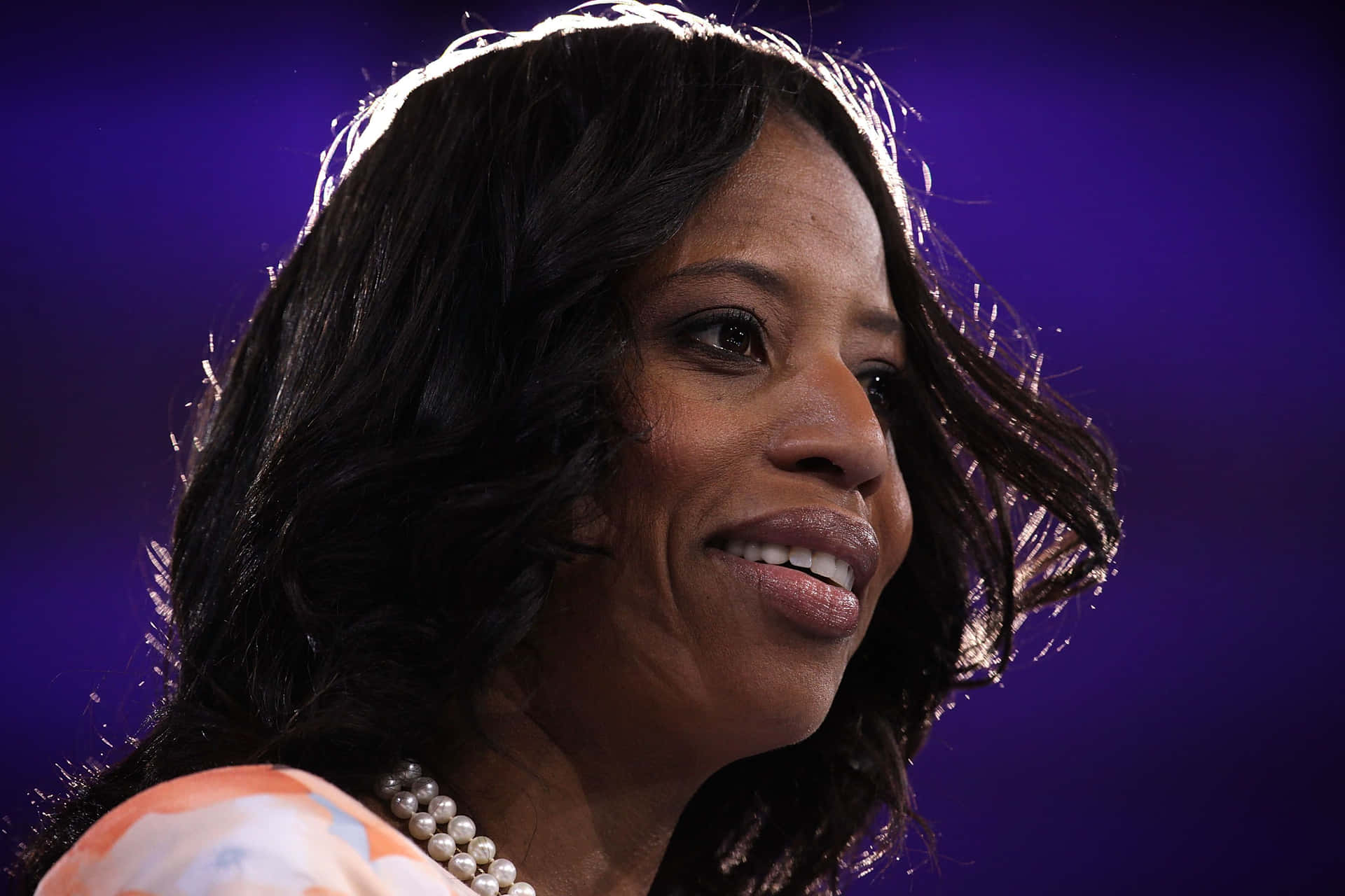Mia Love Smiling Joyfully In A Close-up Portrait Background