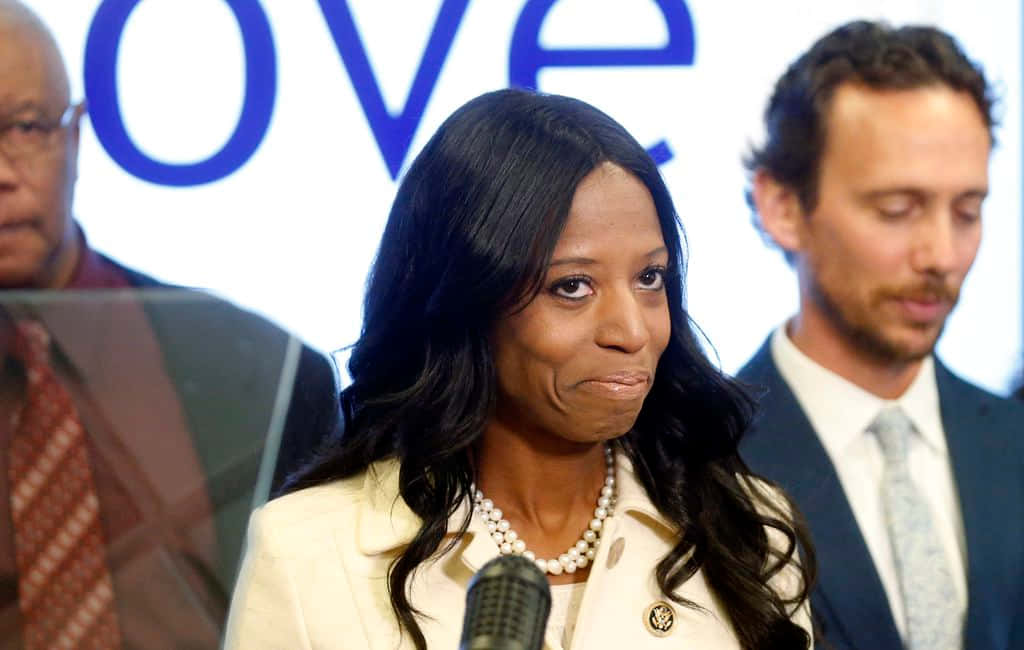 Mia Love With Mischievous Look Background