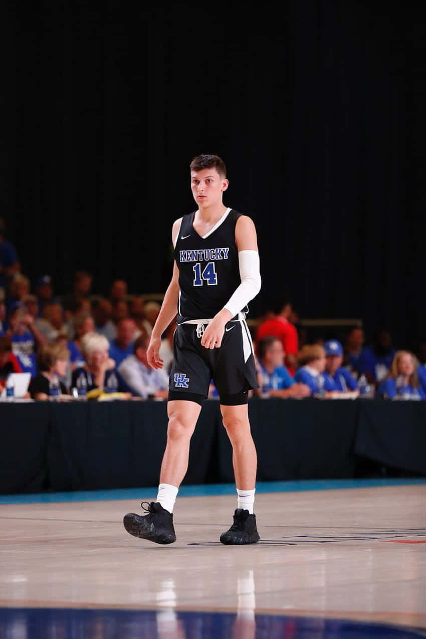 Miami Heat Rookie Tyler Herro Looks To Make A Play Against The Charlotte Hornets Background