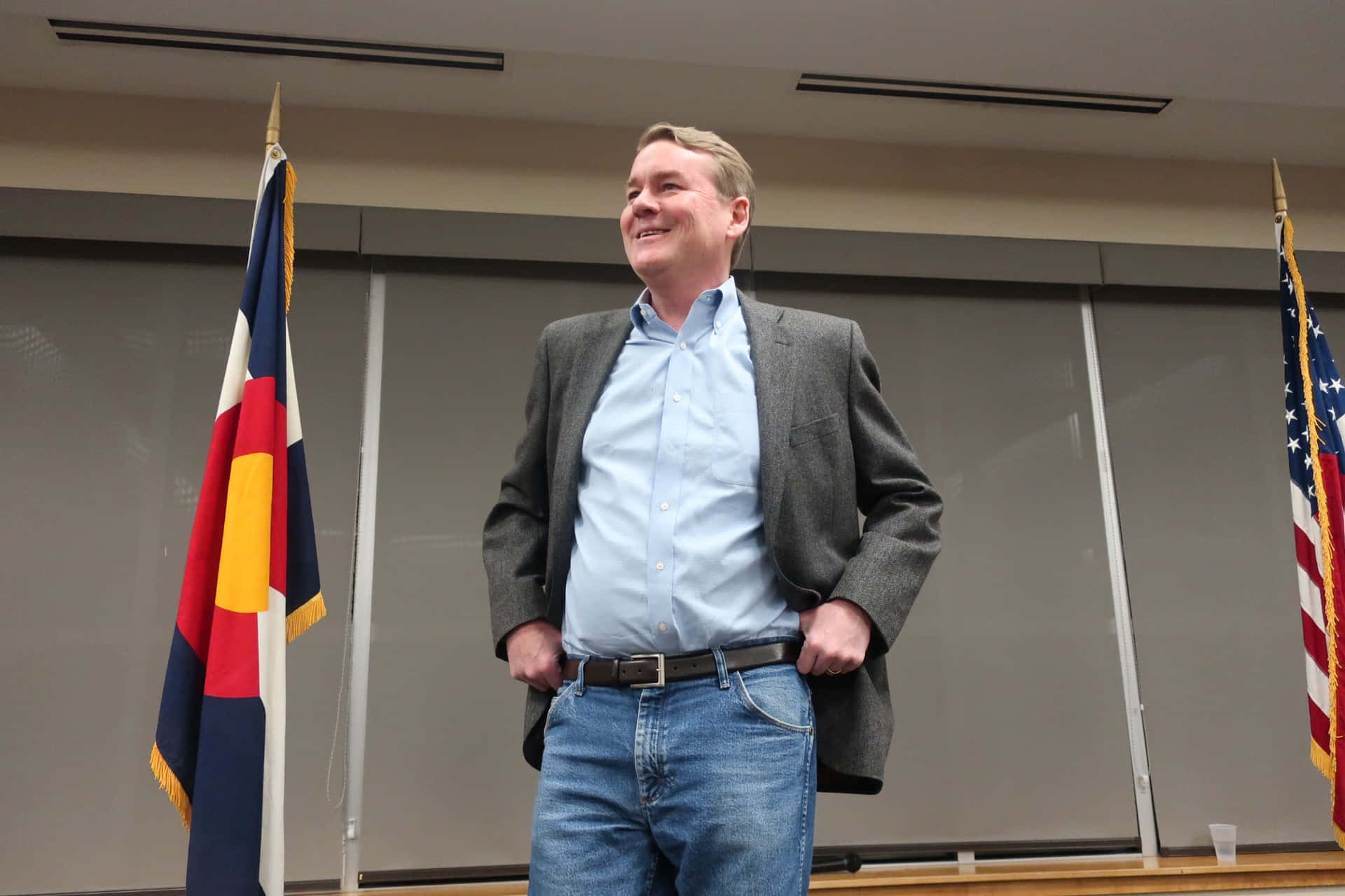 Michael Bennet Delivering An Inspiring Speech Background