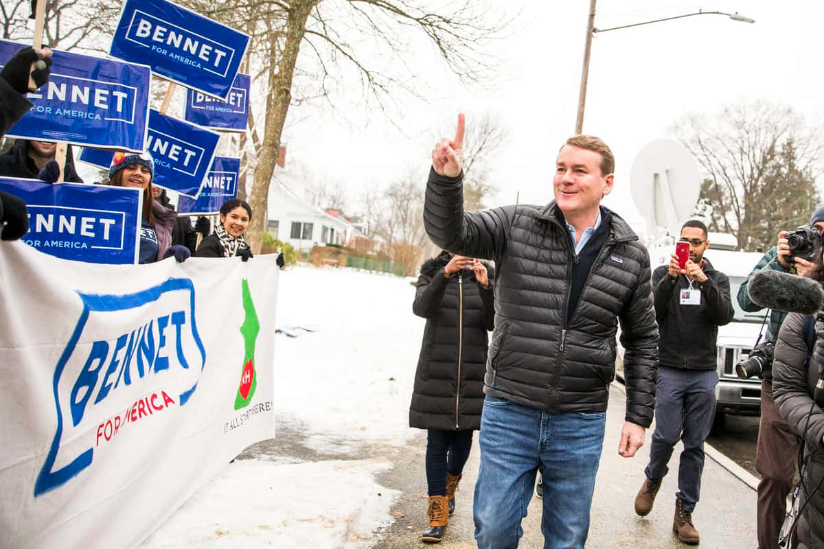 Michael Bennet Grinning Background