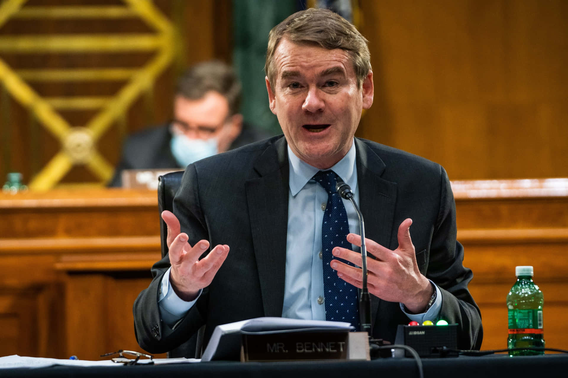 Michael Bennet Hand Gesture While Talking Background