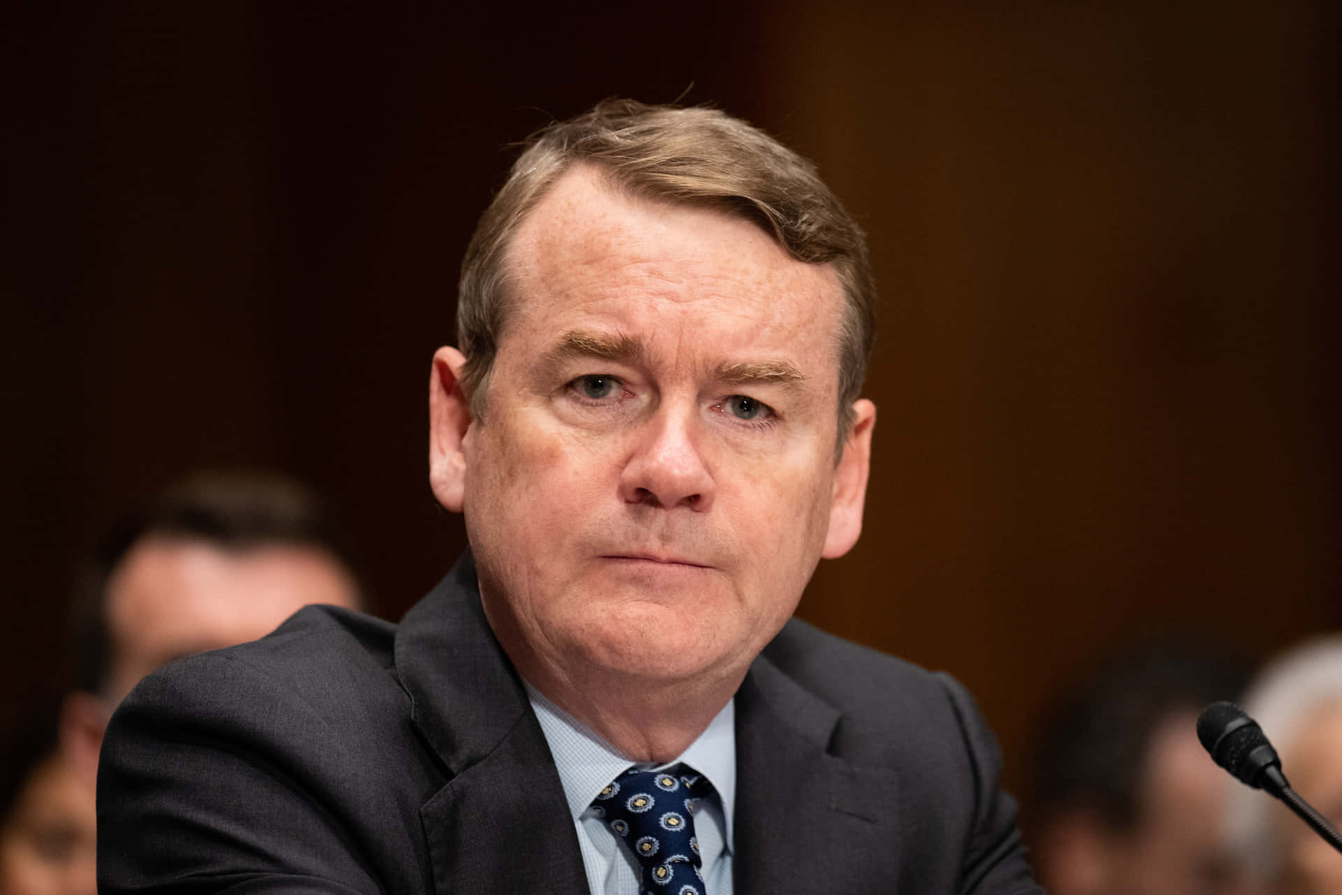 Michael Bennet Looking At Camera Background