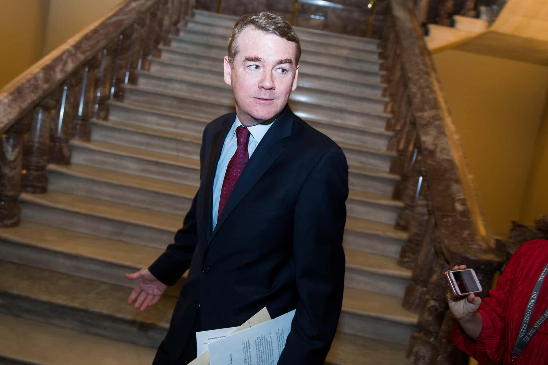 Michael Bennet Near The Stairs Background