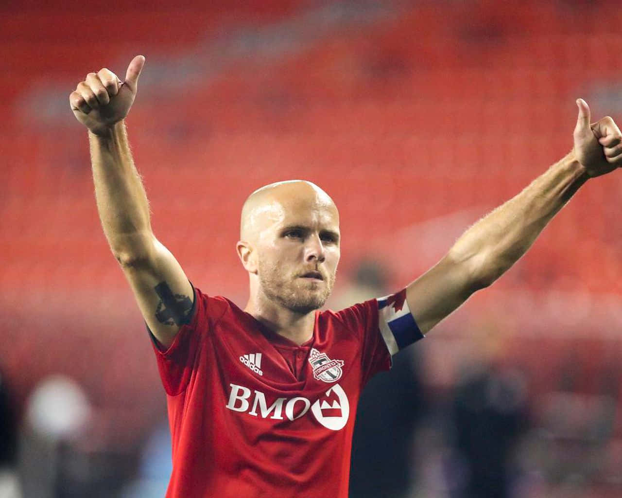 Michael Bradley Makes A Thumbs Up Gesture Background