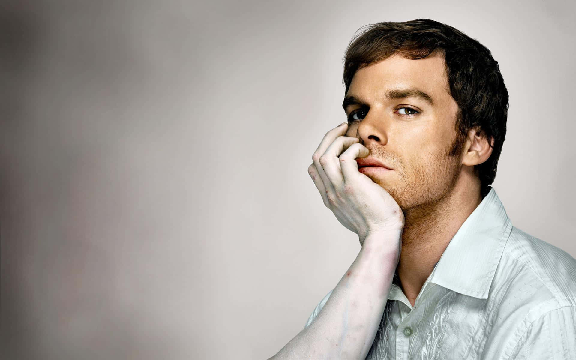 Michael C. Hall In His Iconic Role As Dexter Morgan Background