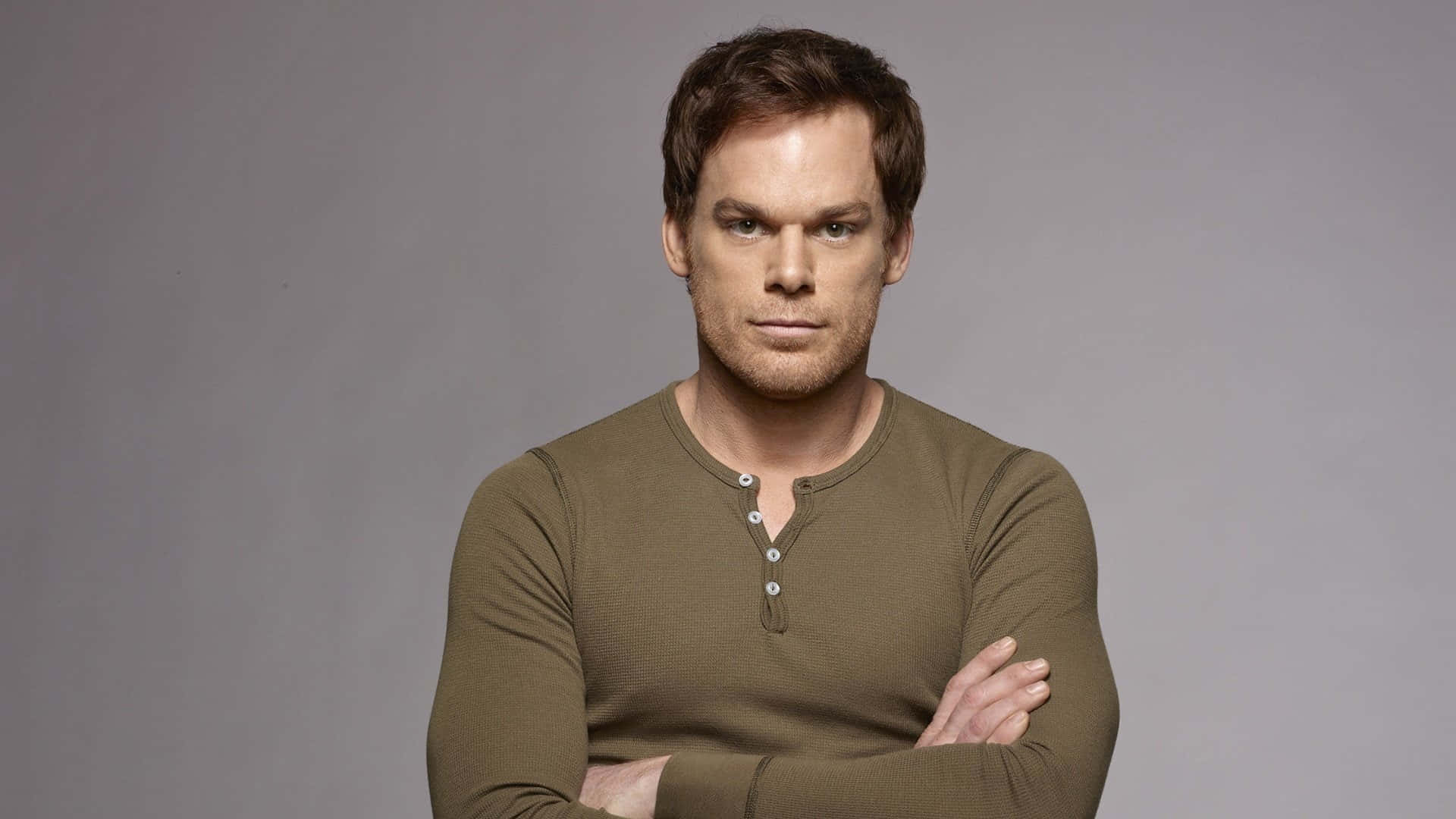 Michael C Hall Looks Directly At The Camera Background