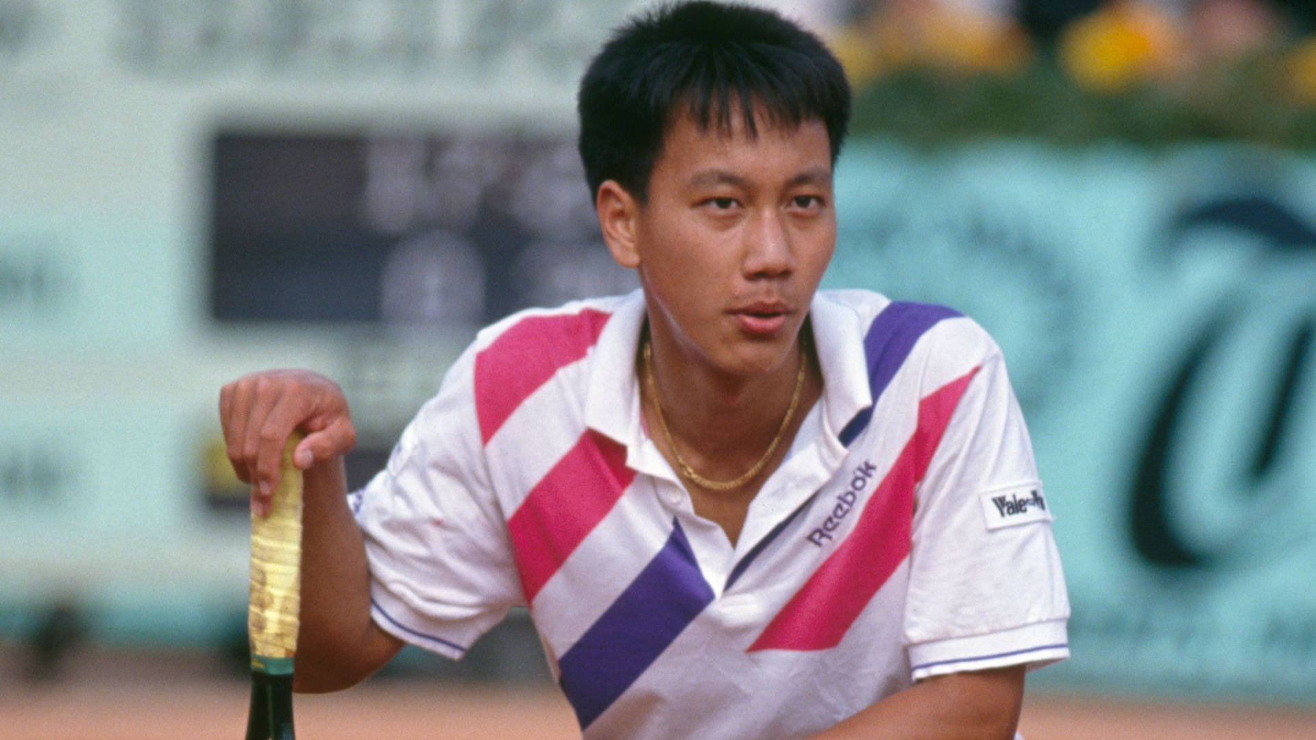 Michael Chang Kneeling On Tennis Court