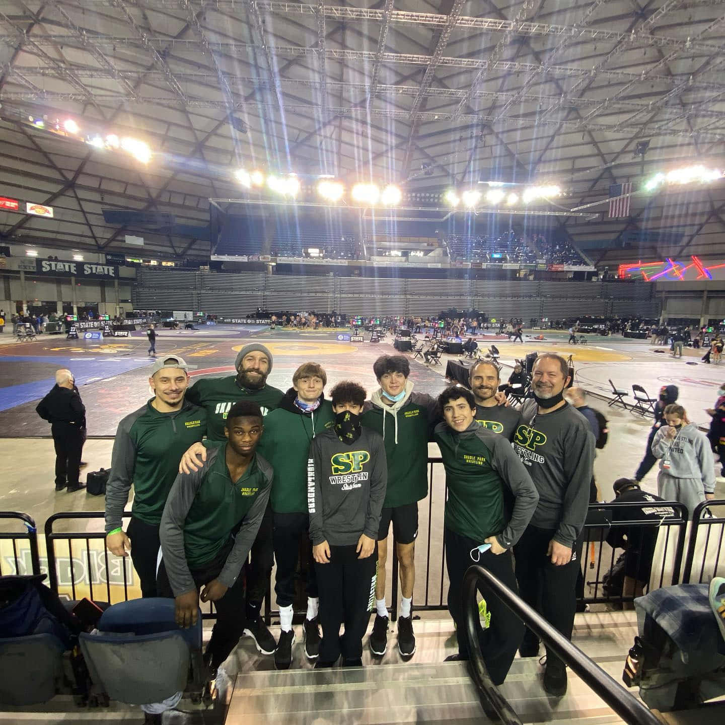 Michael Chiesa With Shadle Park Wrestling Team Background