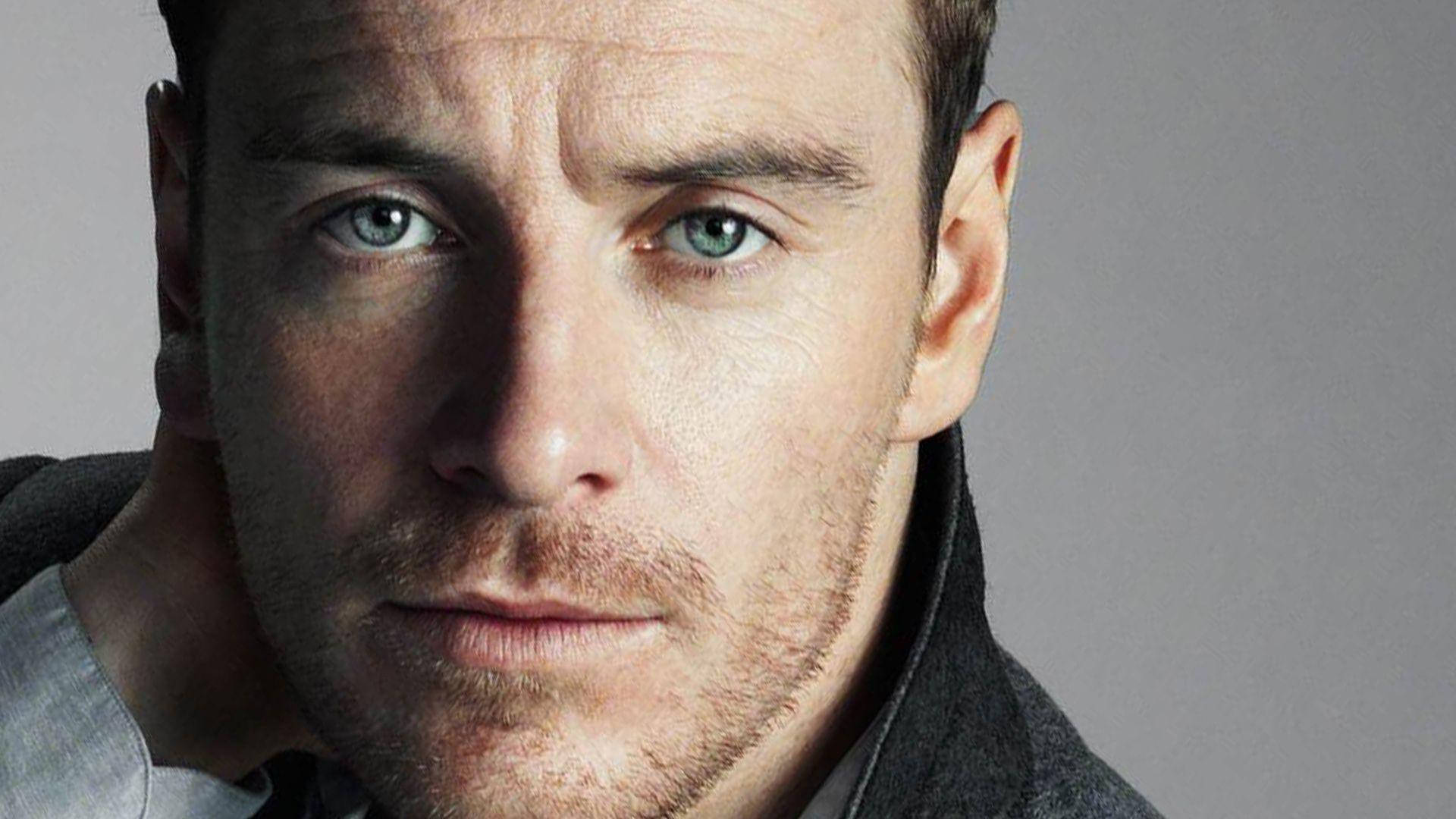 Michael Fassbender With Blue Eyes Background