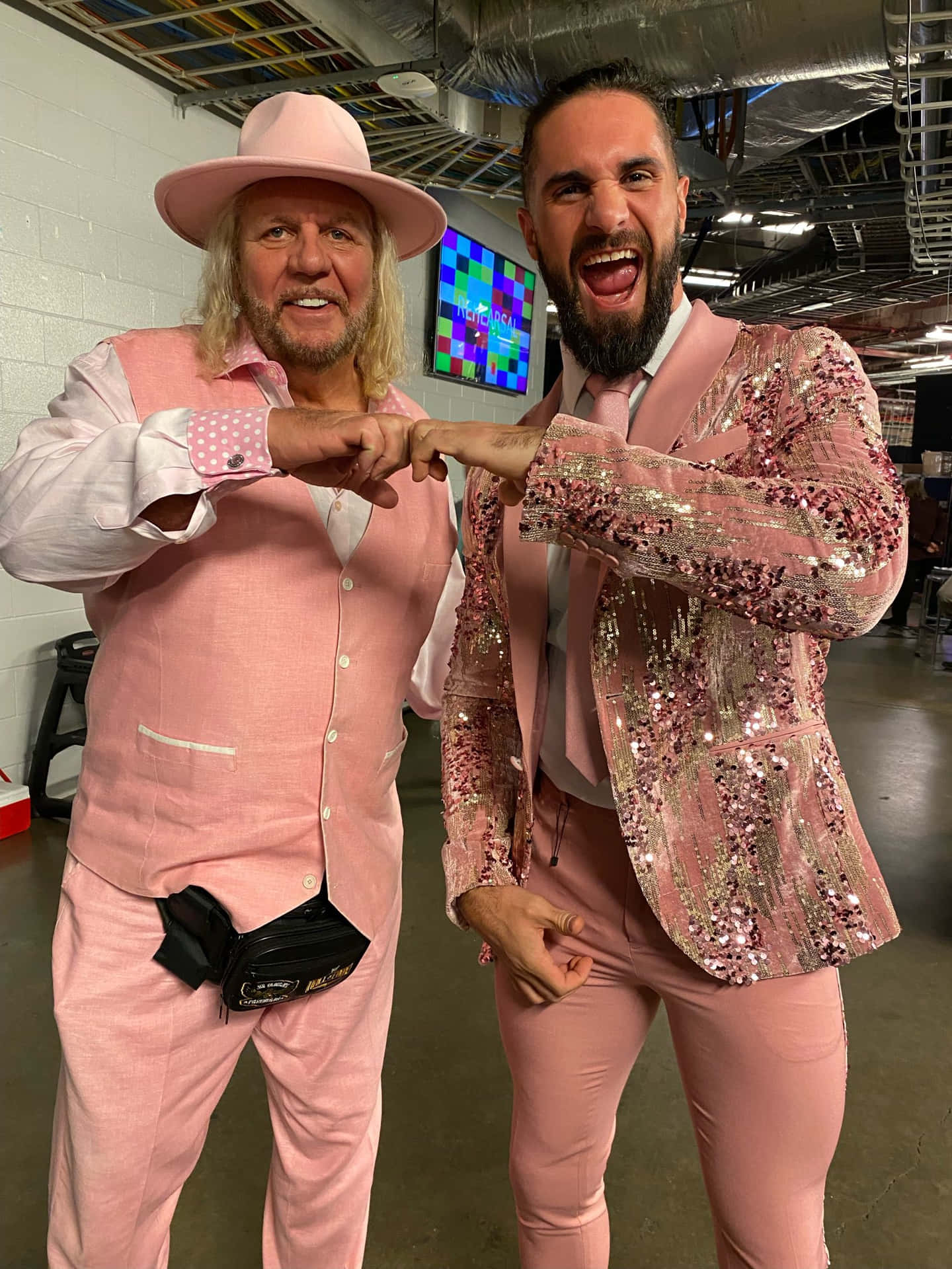 Michael Hayes In Pink Suit Background
