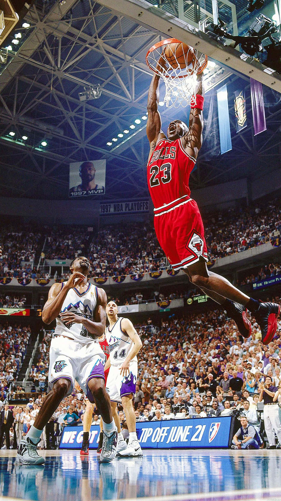 Michael Jordan Gracefully Throws A Dunk.