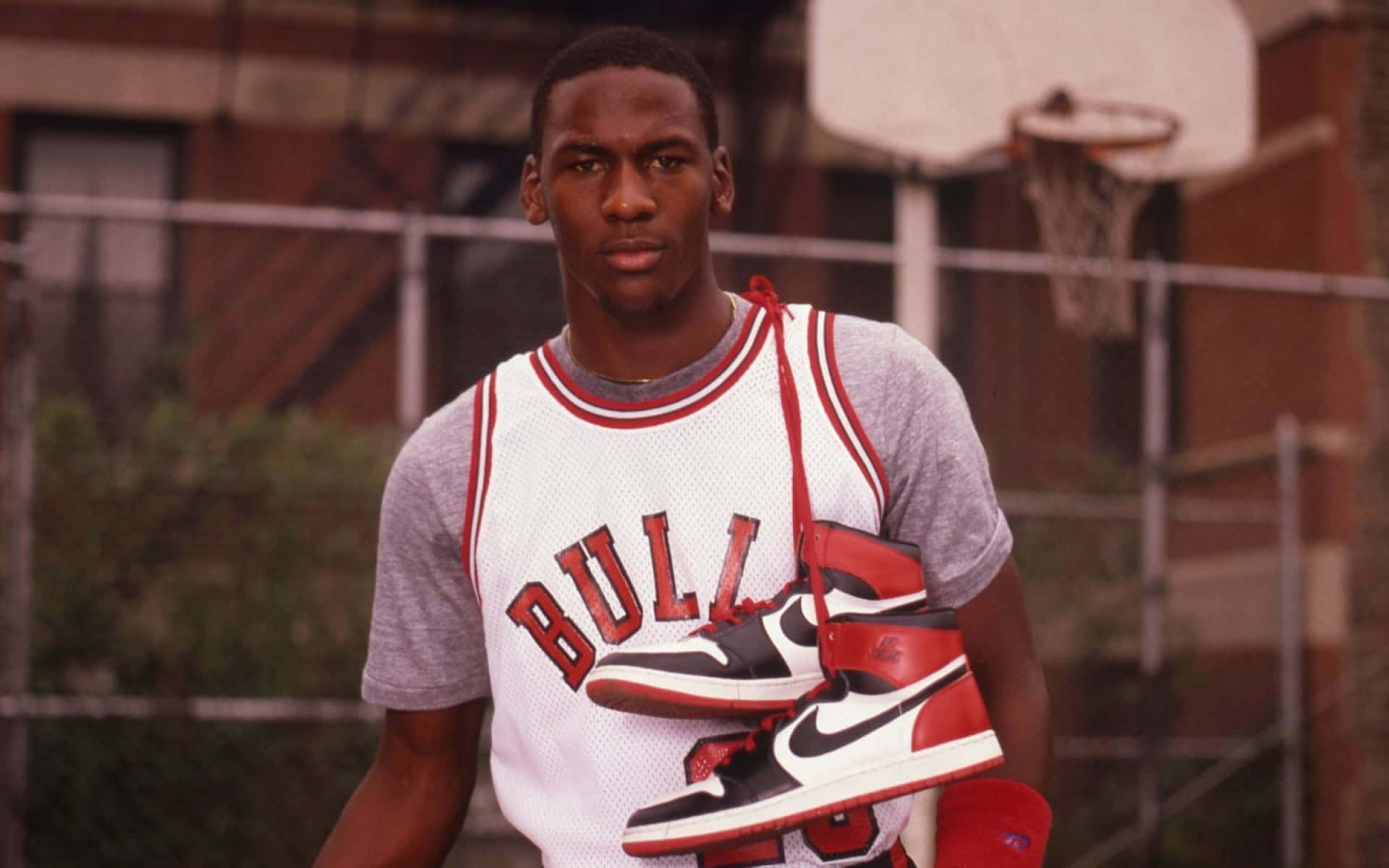 Michael Jordan In His Iconic Jersey Background
