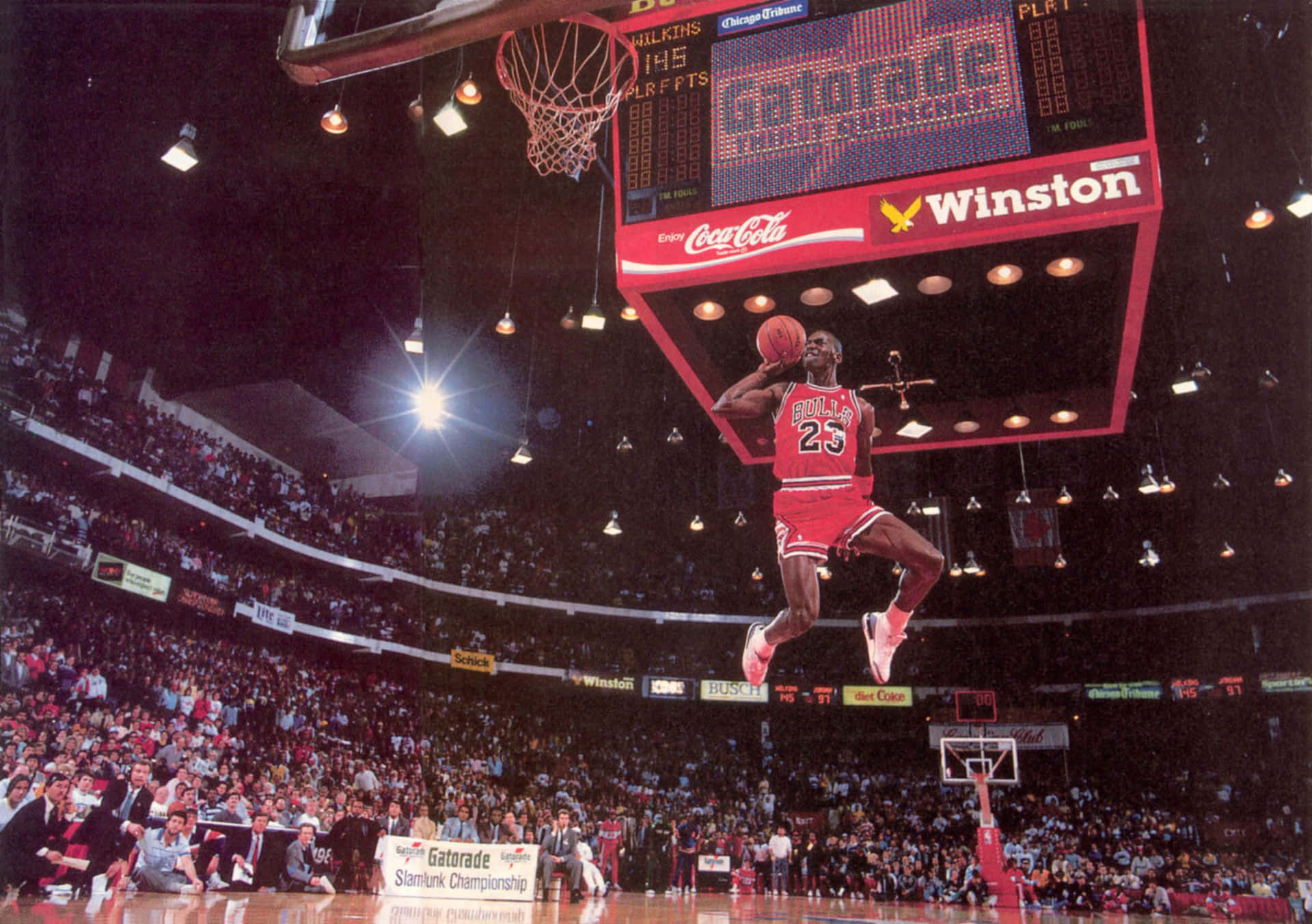 Michael Jordan Soars Above The Rim With A Gravity-defying Dunk. Background