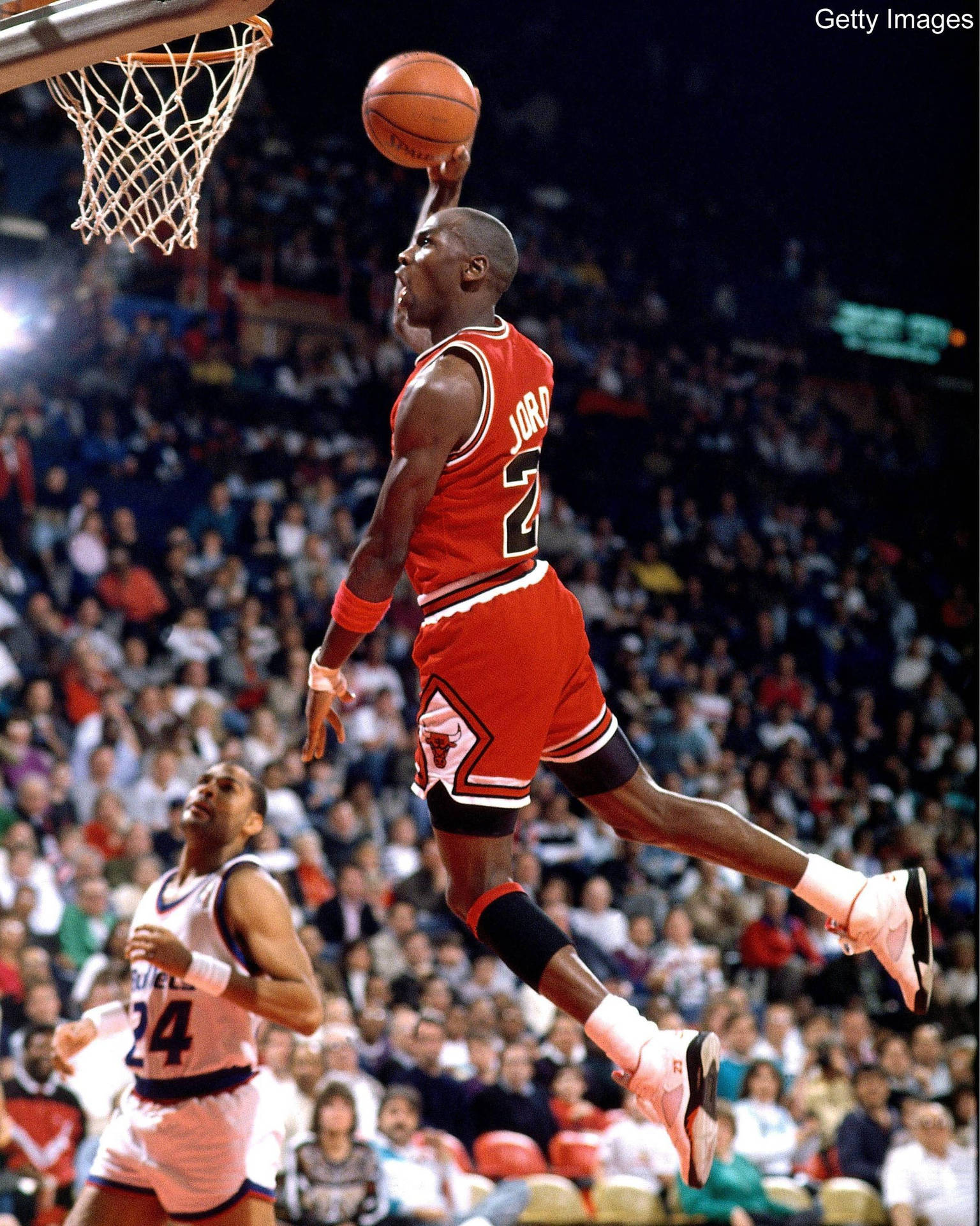 Michael Jordan Soars Through The Air Background