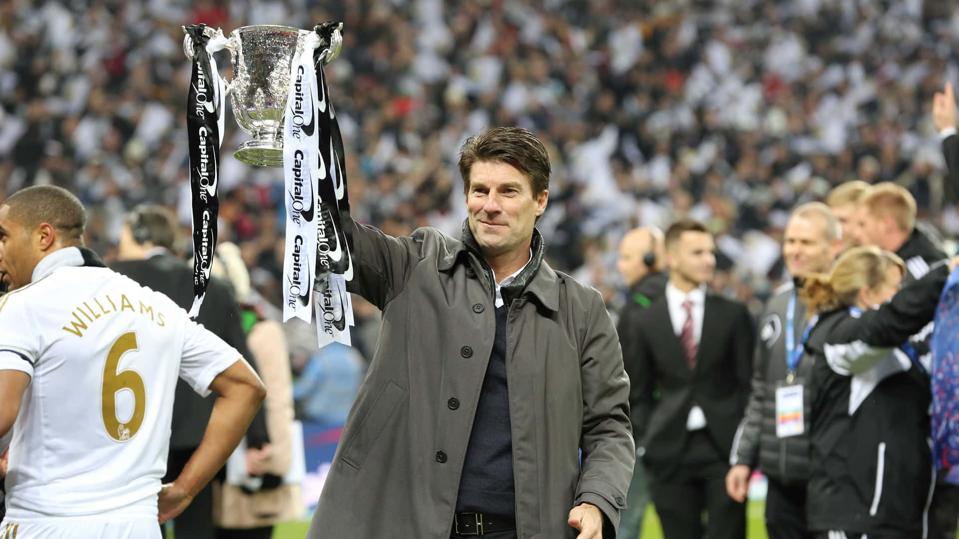 Michael Laudrup Holding Capital One Cup Background