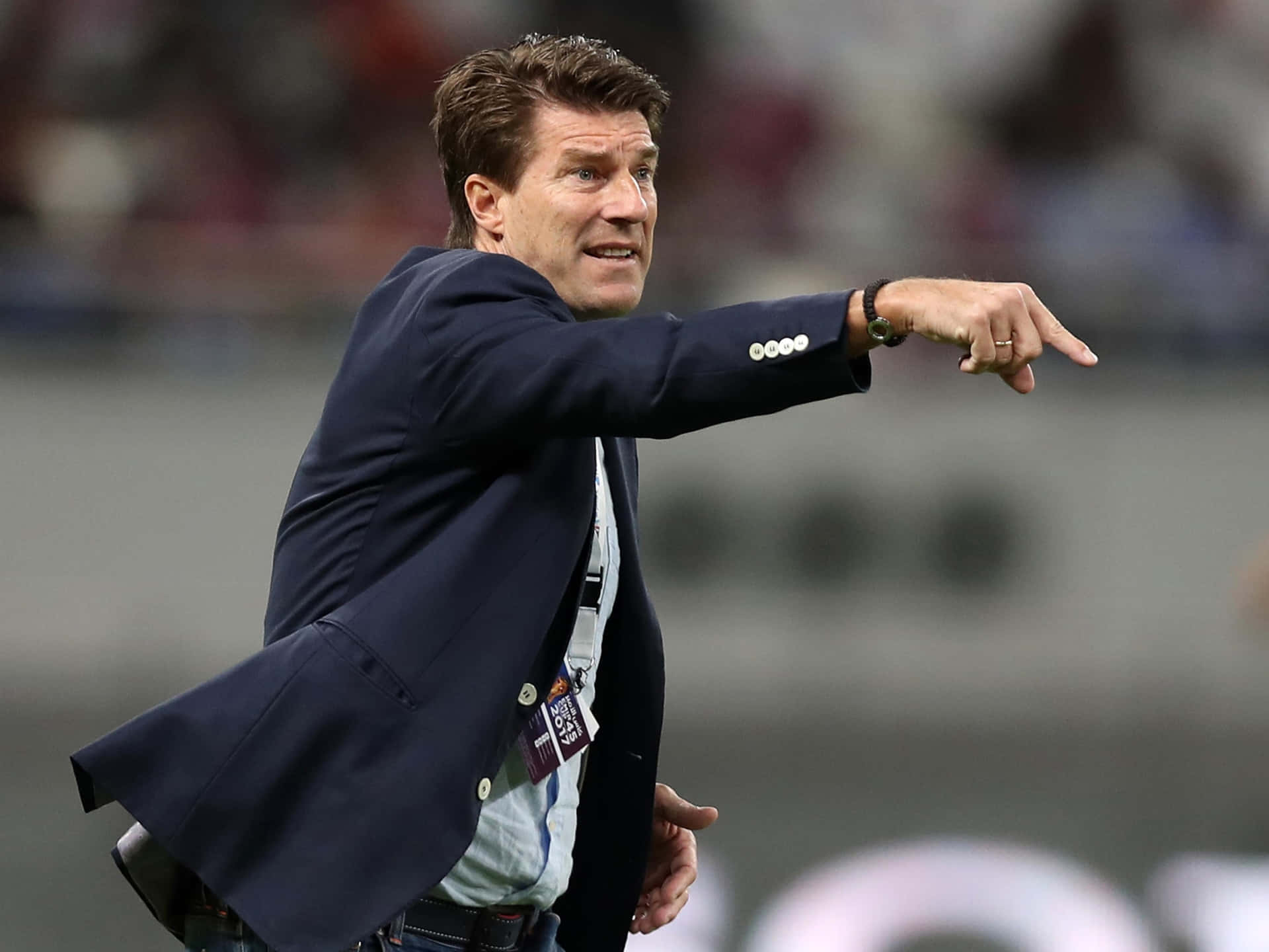 Michael Laudrup Making A Gesture Background