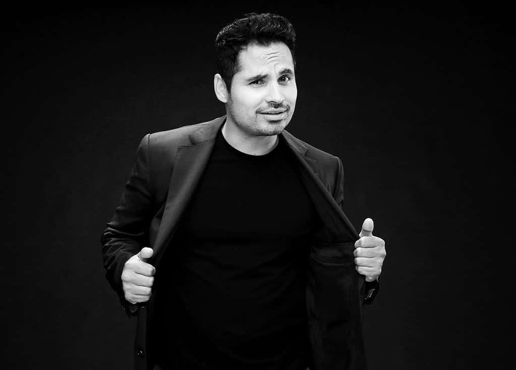 Michael Peña Looking Cool And Confident Background
