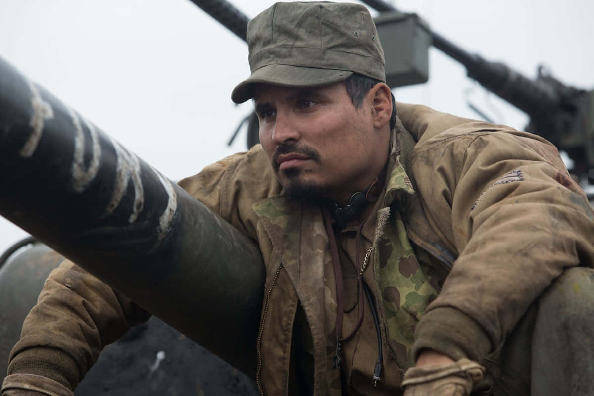Michael Peña Shares A Proud Smile. Background