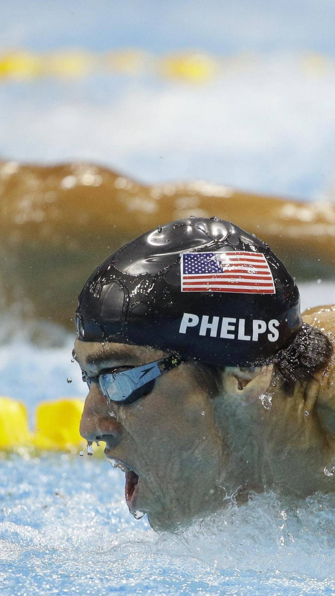 Michael Phelps Holding The Usa Flag With Pride