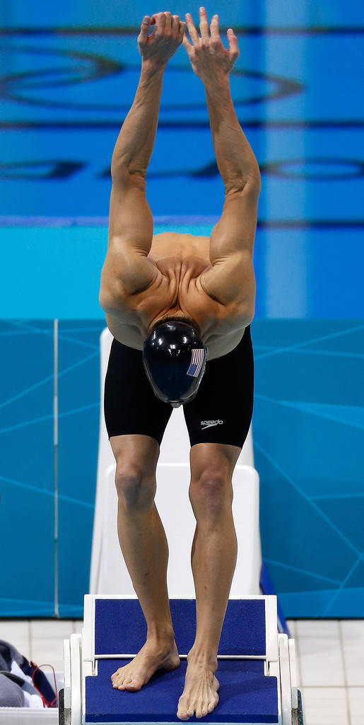 Michael Phelps In Mid-dive Action Background