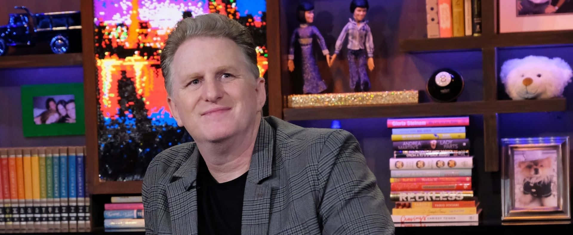 Michael Rapaport Striking A Confident Pose On A Dramatic Dark Background