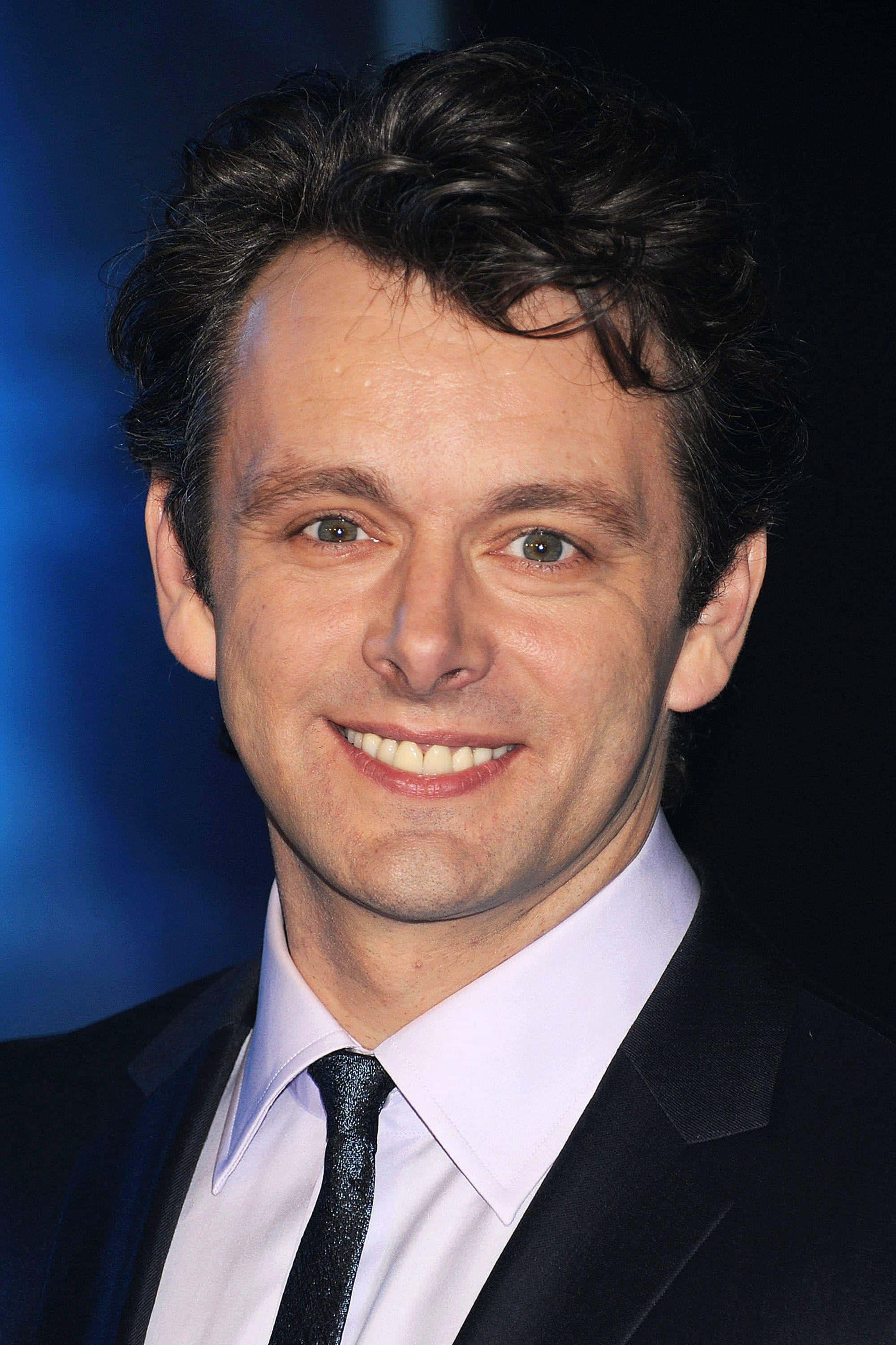 Michael Sheen Gives A Devilish Grin Background