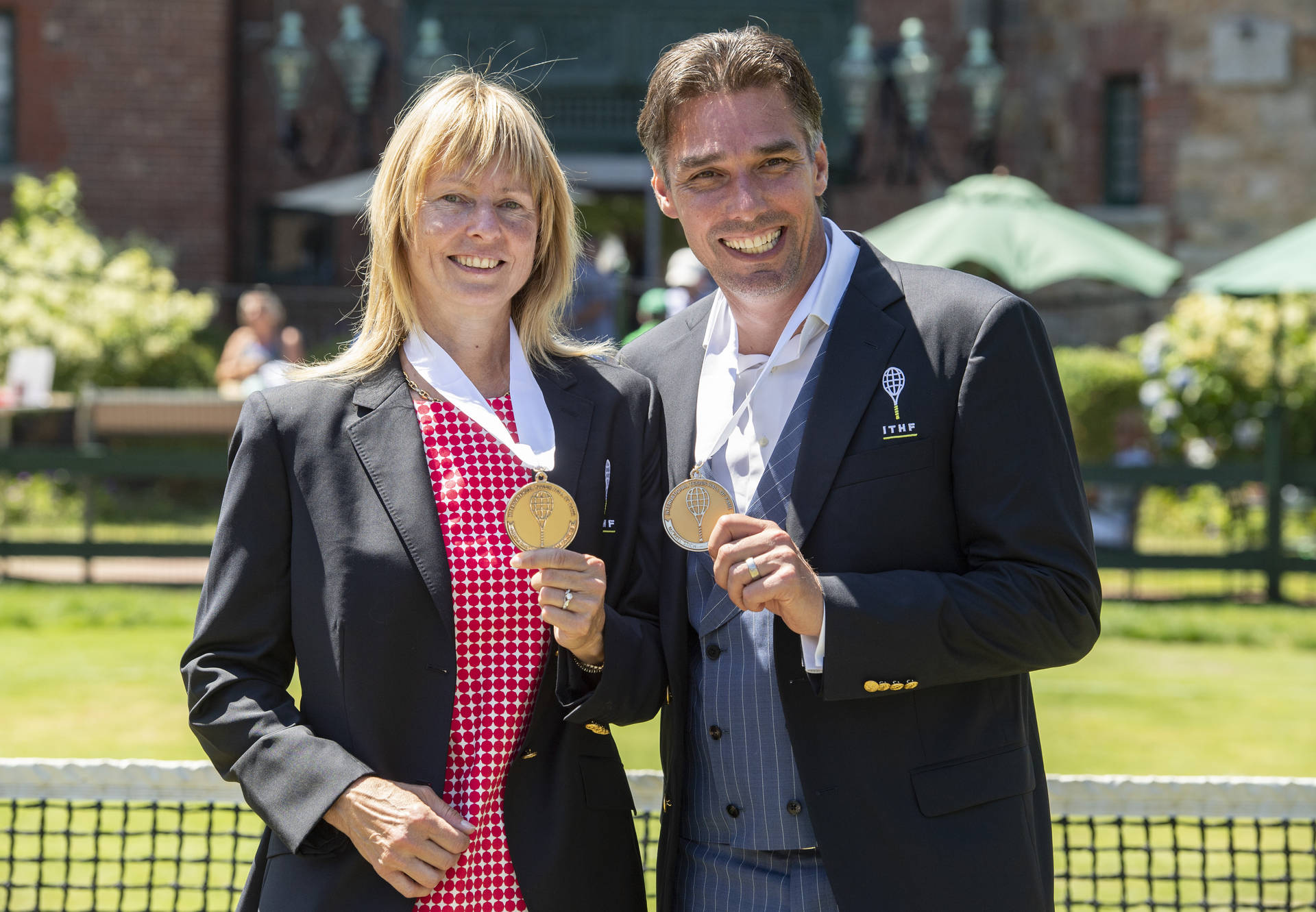 Michael Stich And Helena Sukova Proudly Displaying Their Medals. Background