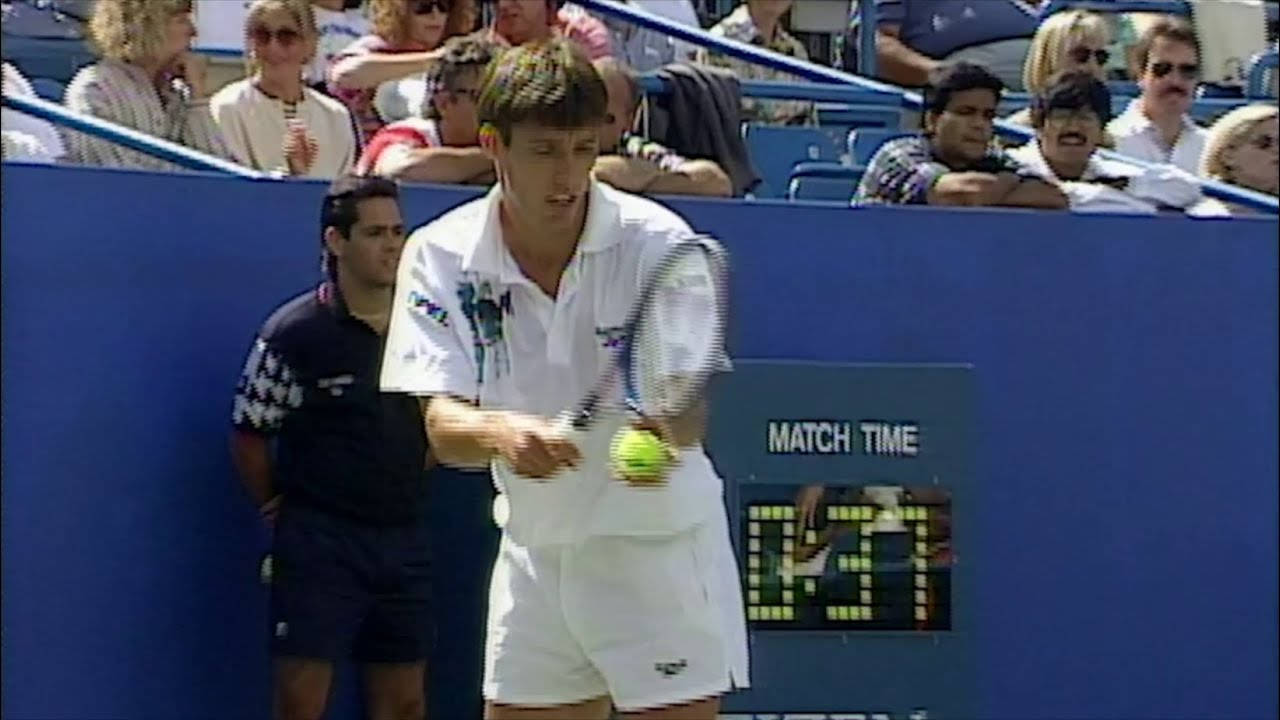 Michael Stich Holding Ball And Racket Background