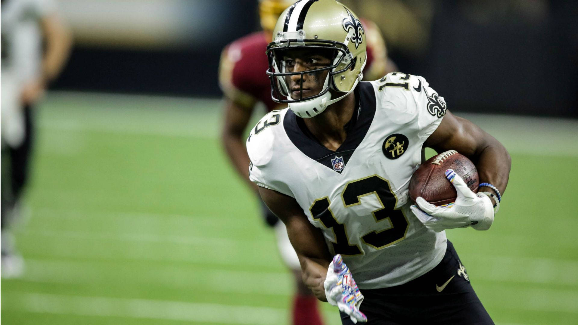 Michael Thomas Running With Ball Background