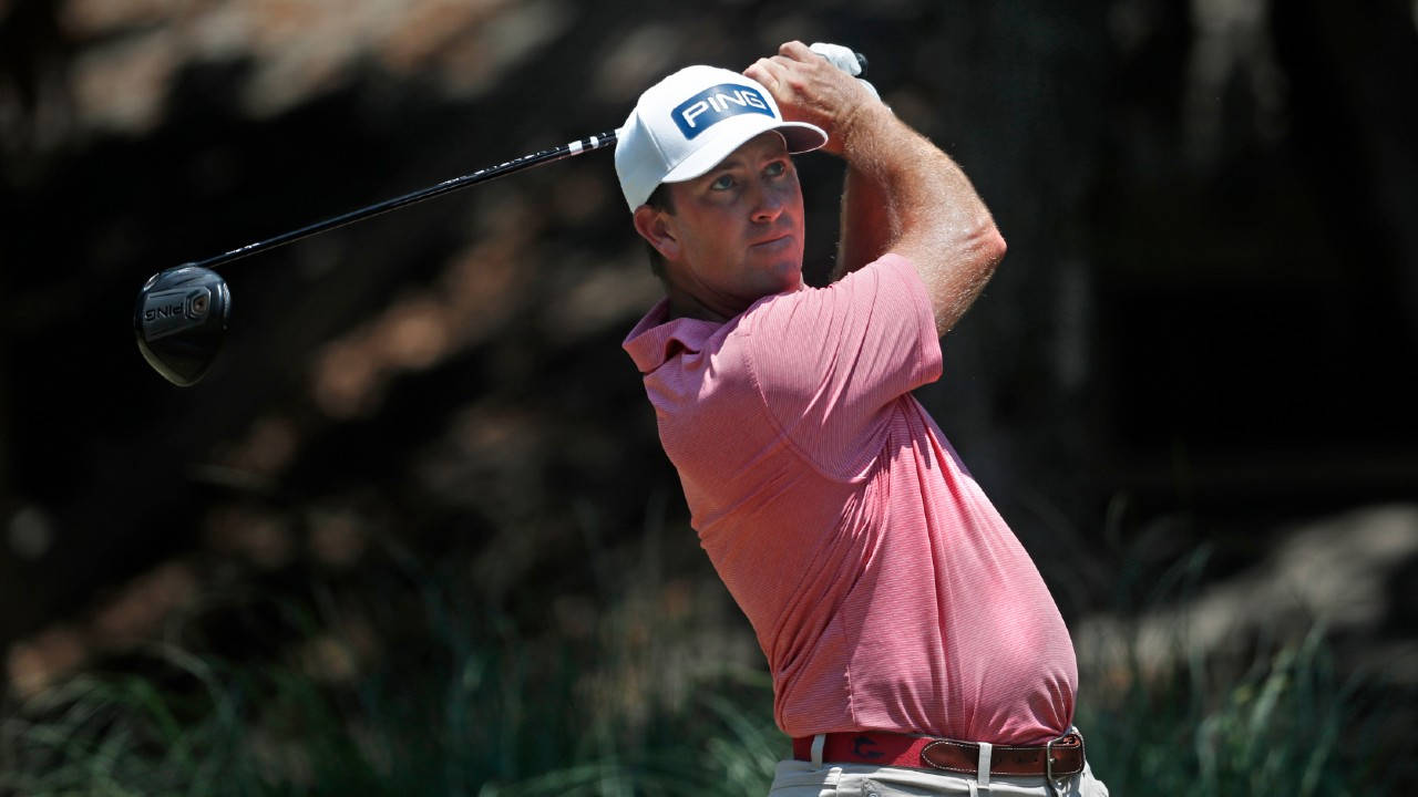 Michael Thompson Perfecting His Swing On The Golf Course Background