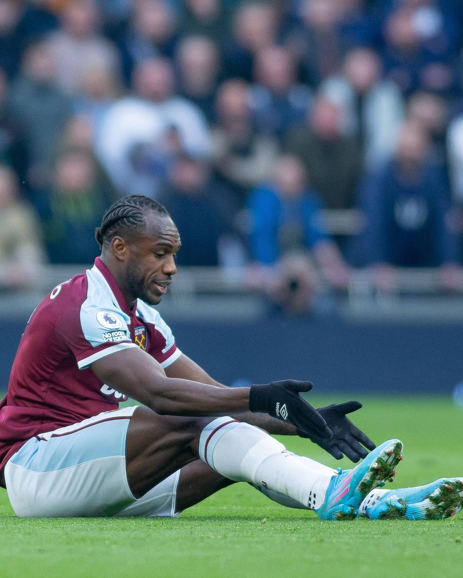 Michail Antonio Sitting On Ground Background