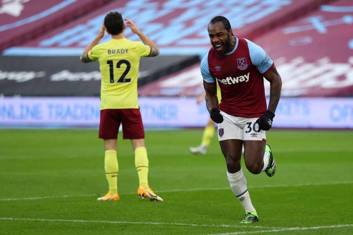 Michail Antonio With Yellow Shirt Player Background