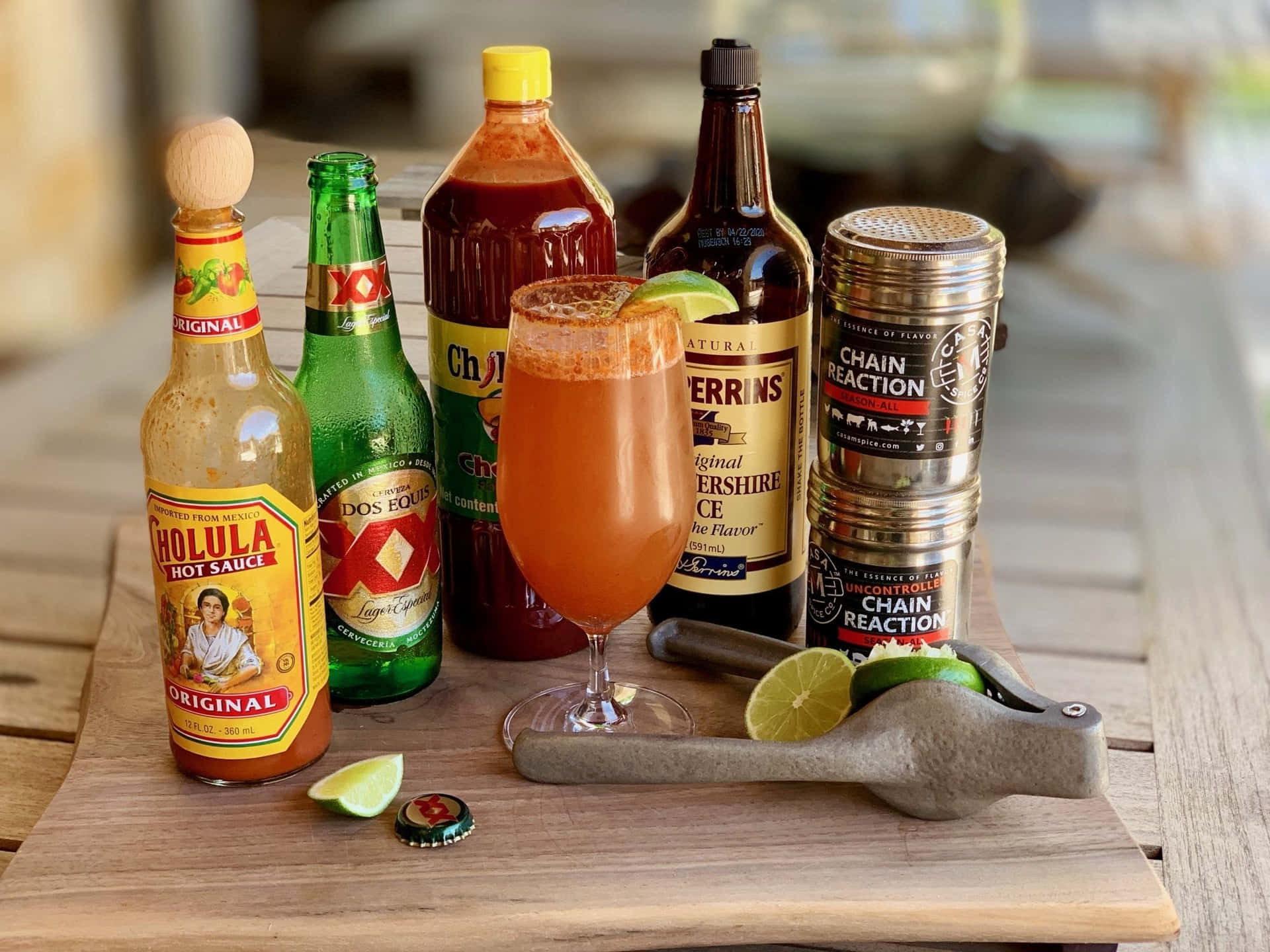 Michelada Ingredientsand Dos Equis Beer Background
