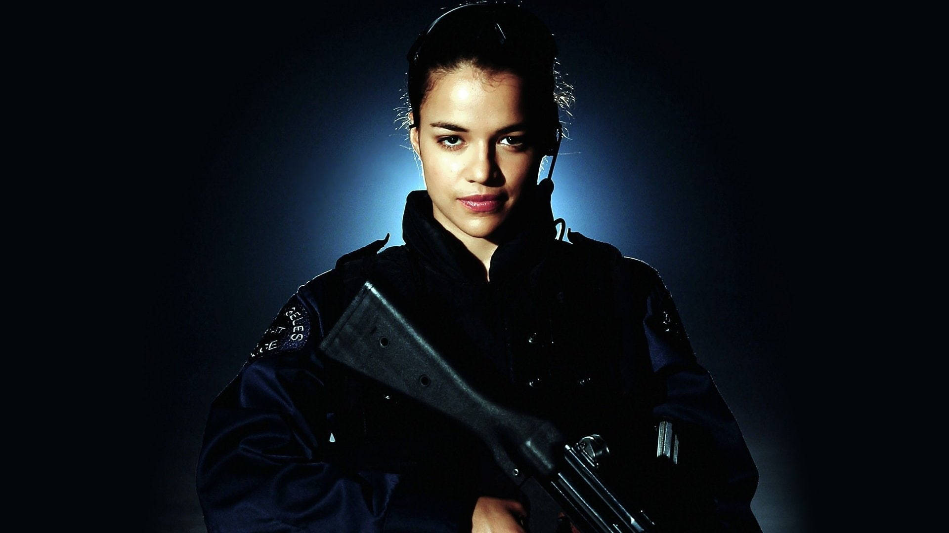 Michelle Rodriguez As Officer Christina Sanchez Background