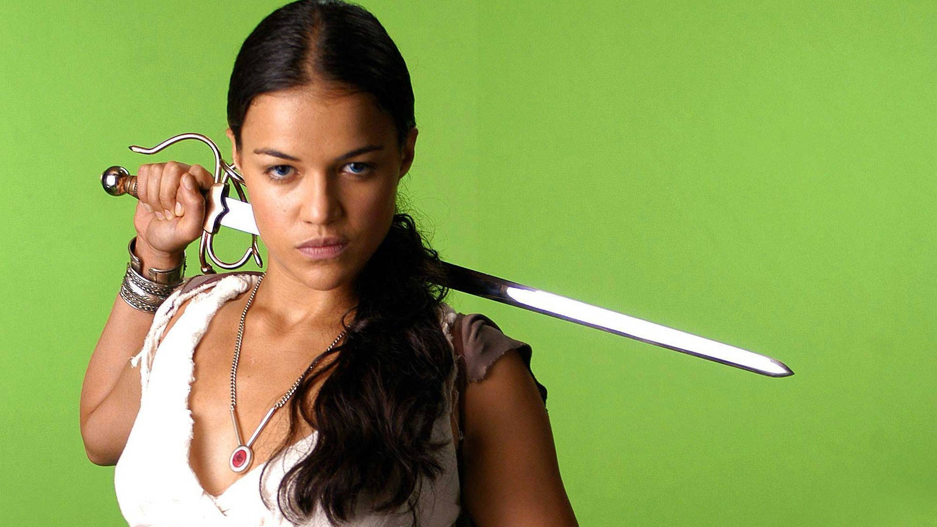 Michelle Rodriguez With A Sword Background