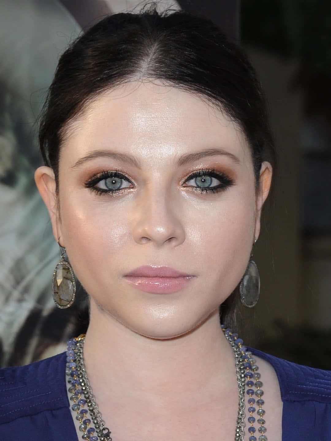 Michelle Trachtenberg Striking A Pose In A Stylish Outfit Background