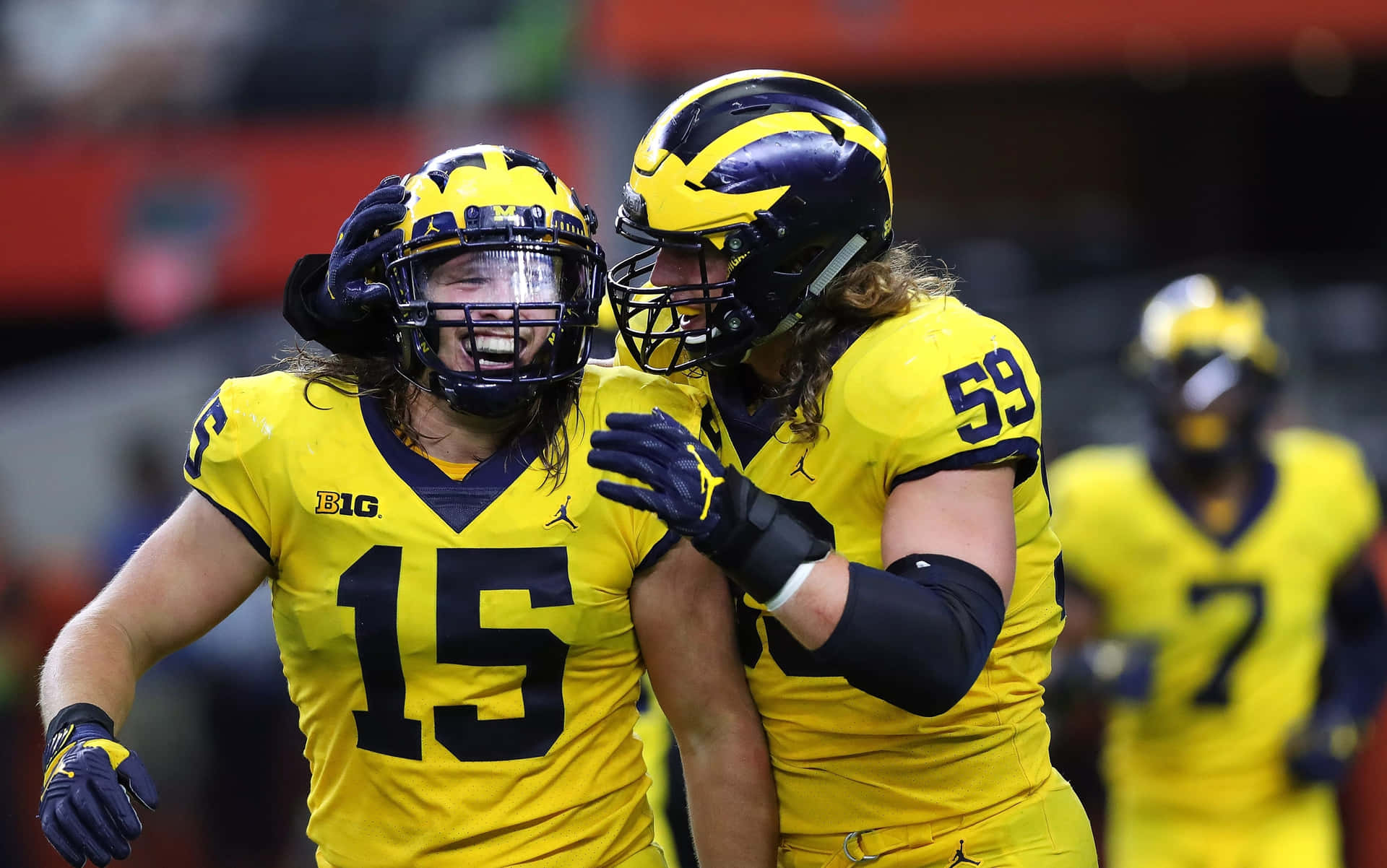 Michigan Football Players Alan Bowman And Nolan Knight Background