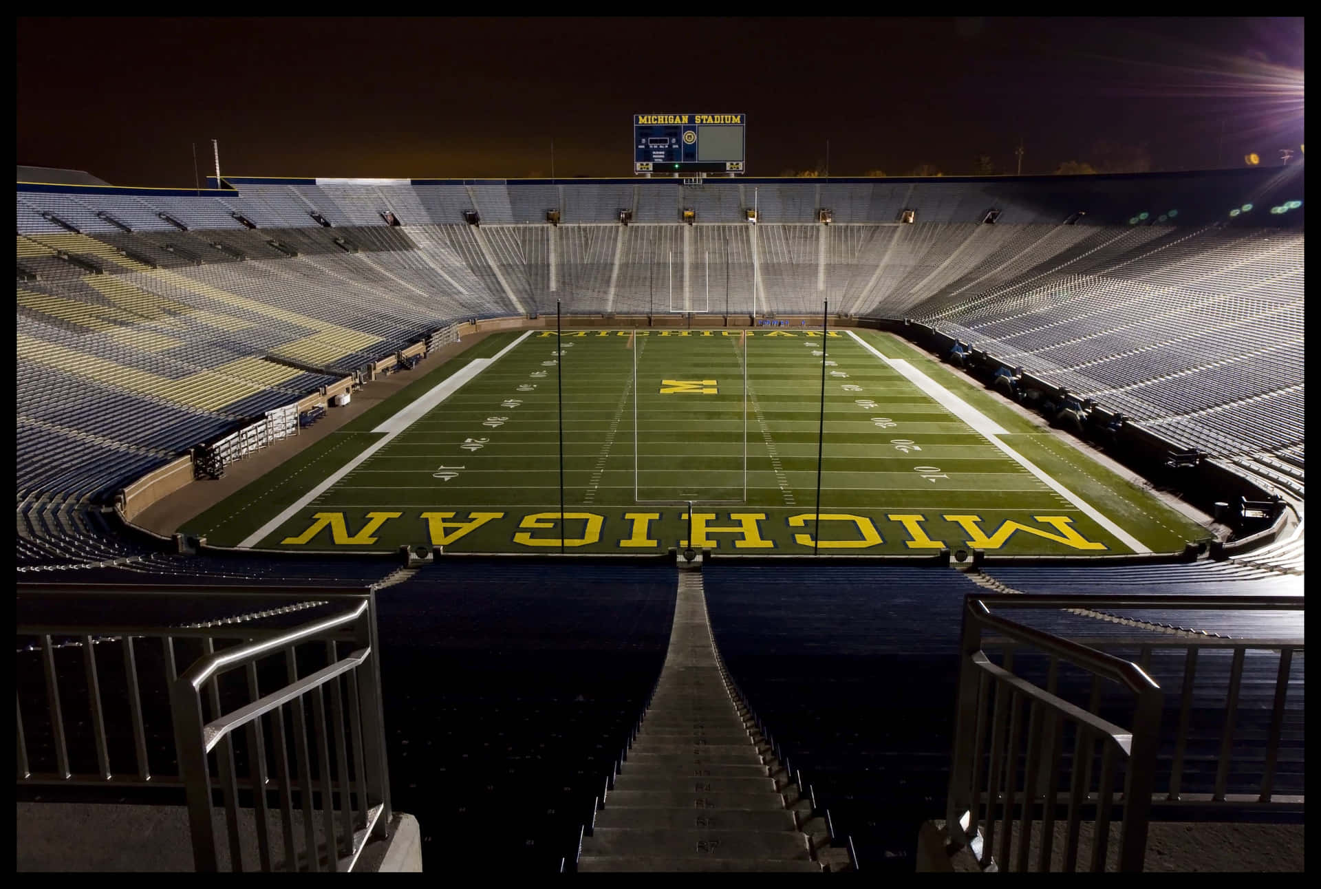 Michigan Wolverines Football Stadium At Night Background