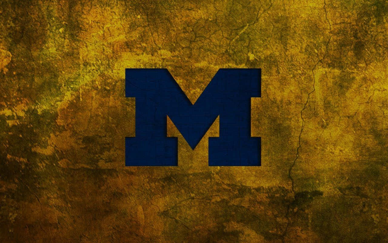 Michigan Wolverines Football Team On The Field Background