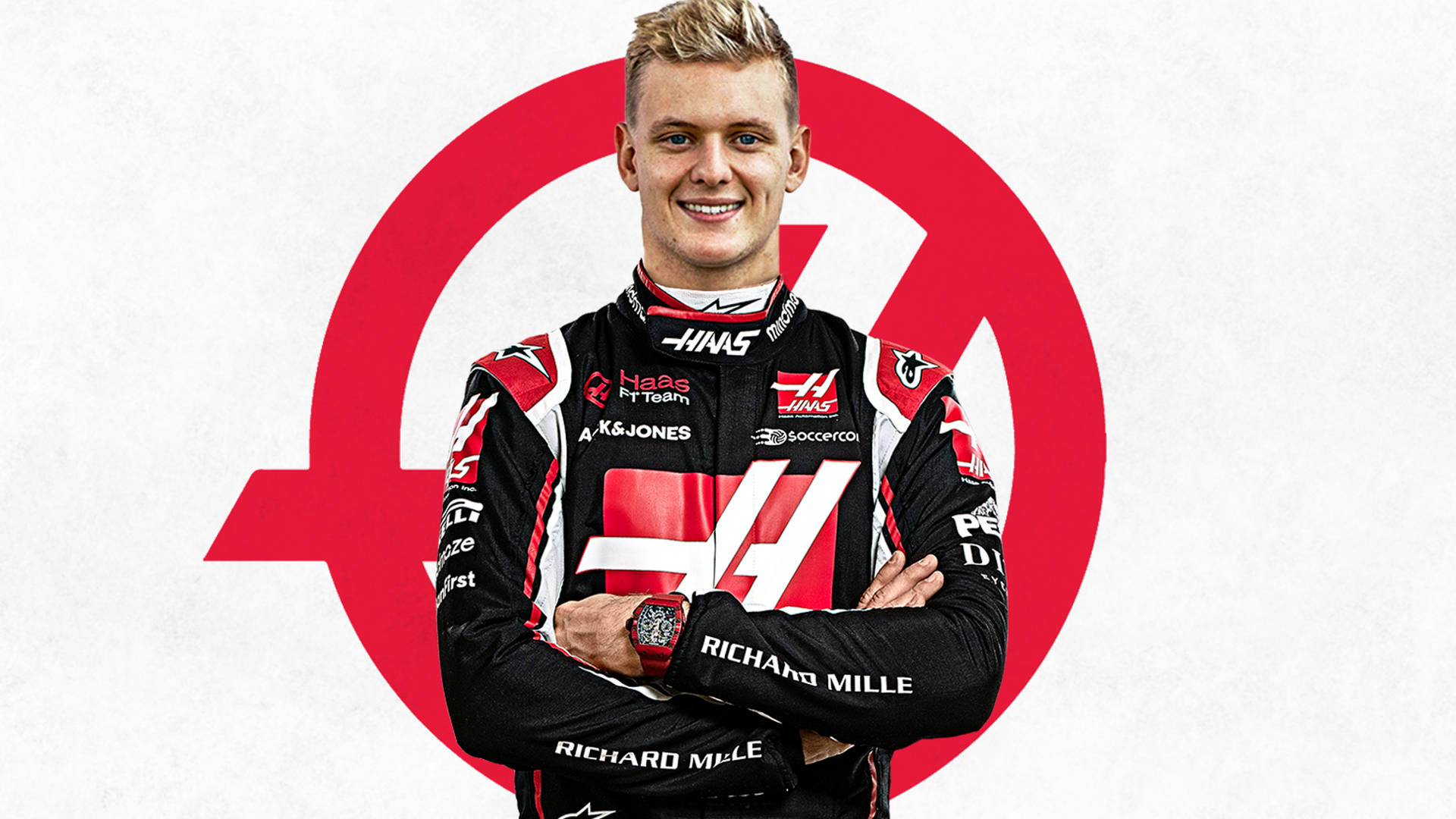 Mick Schumacher Arms Crossed Portrait Background