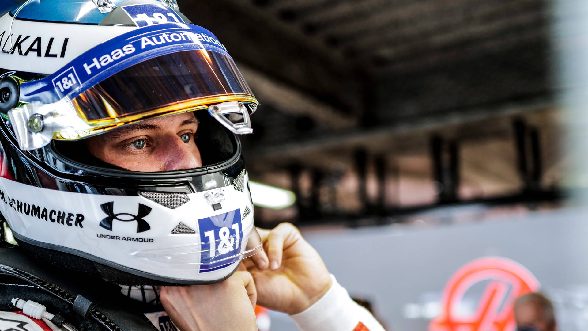 Mick Schumacher Securing His Helmet