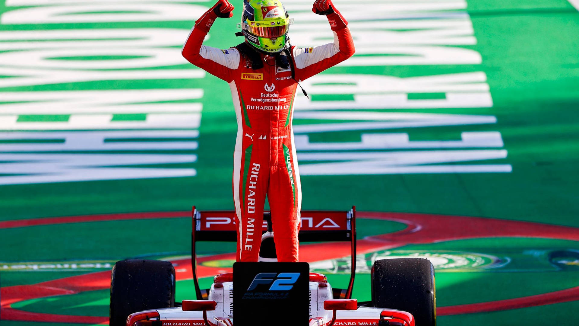 Mick Schumacher Standing With Raised Fists