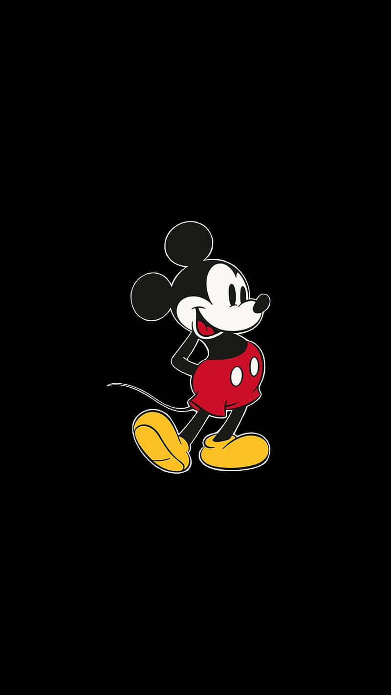 Mickey Mouse Logo On A Black Background Background