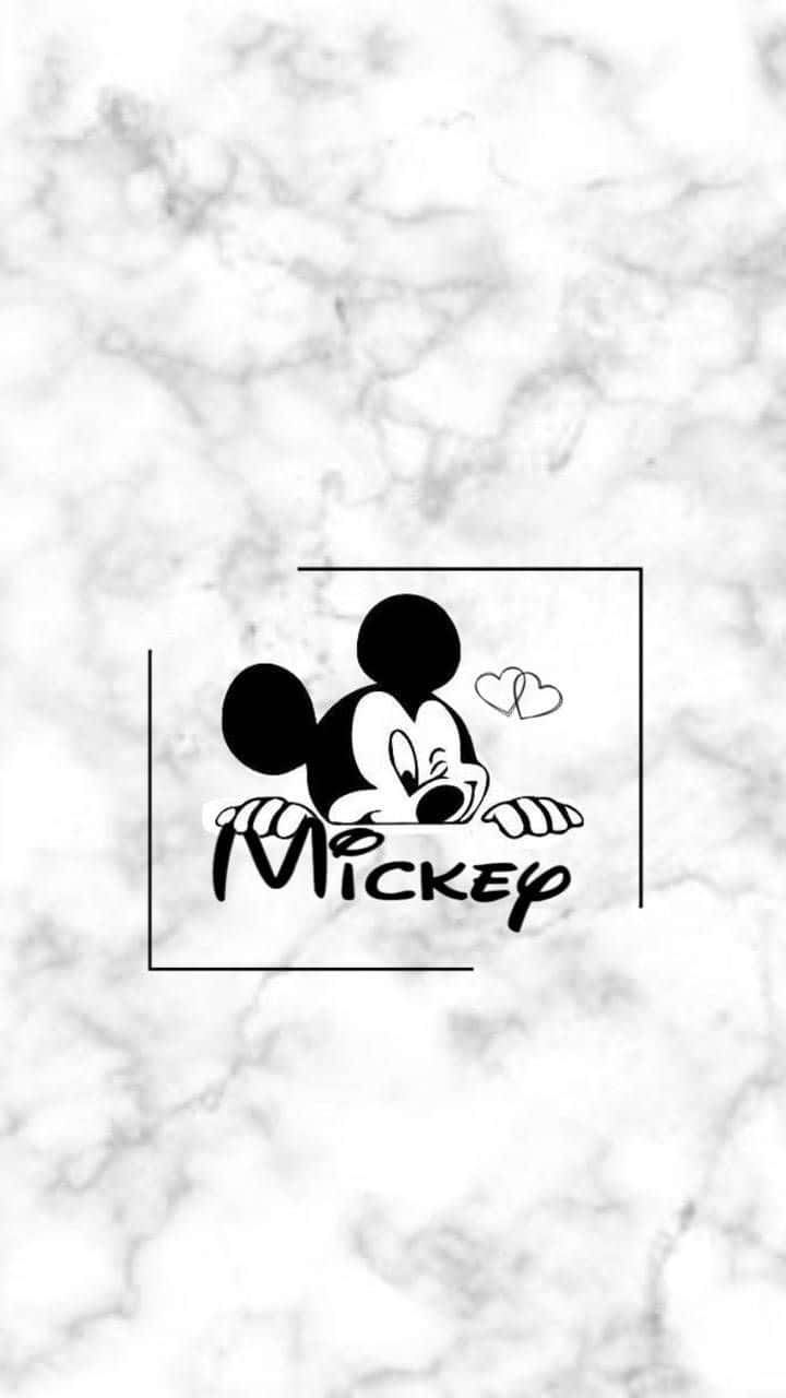 Mickey Mouse Logo On A Marble Background Background
