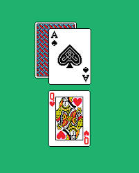 Microsoft Solitaire Queen Of Hearts Over Spade Background