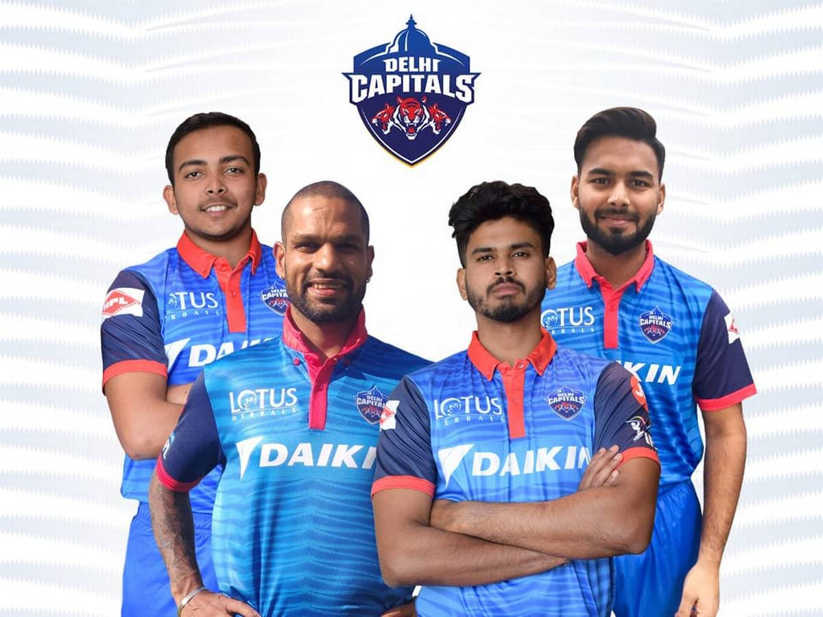 Mighty Delhi Capitals Squad In Action Background